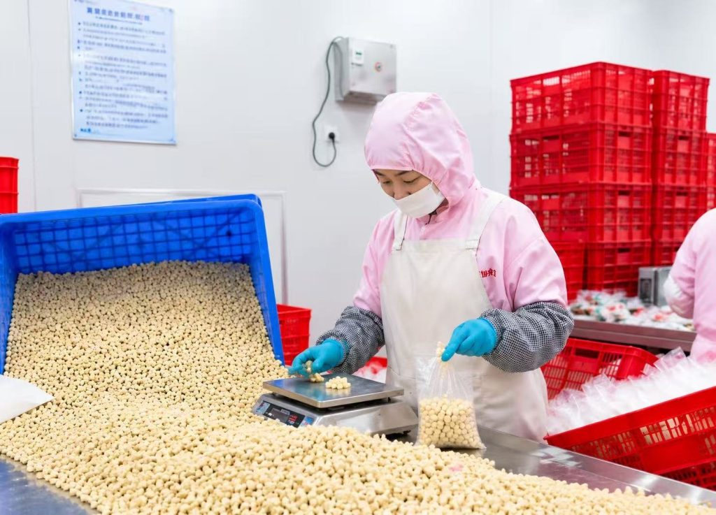 Pet treat production weighing at HEYUAN PET facility