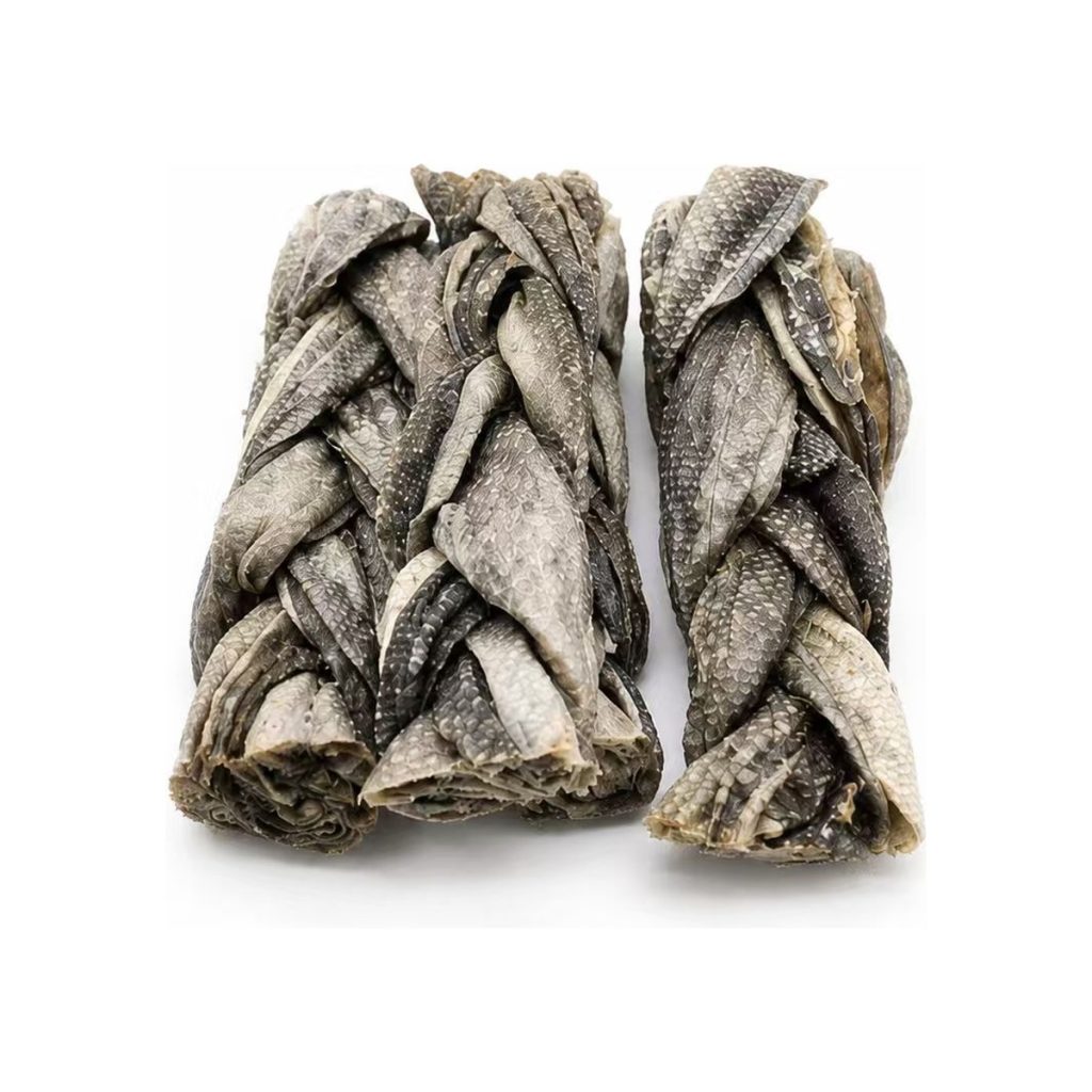 Braided cod fish skin dog treats on white background